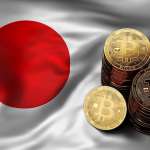 monety bitcoin na fladze japonii