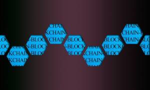 napis blockchain na tle plastrów miodu